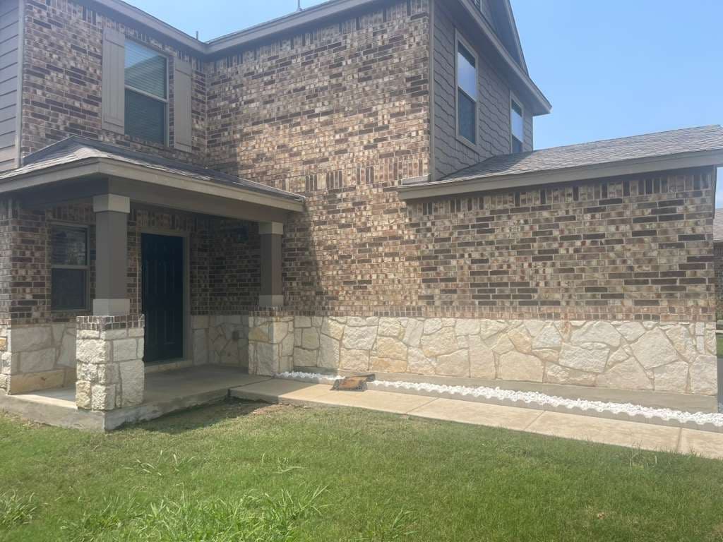 House Exterior Cleaning Results after